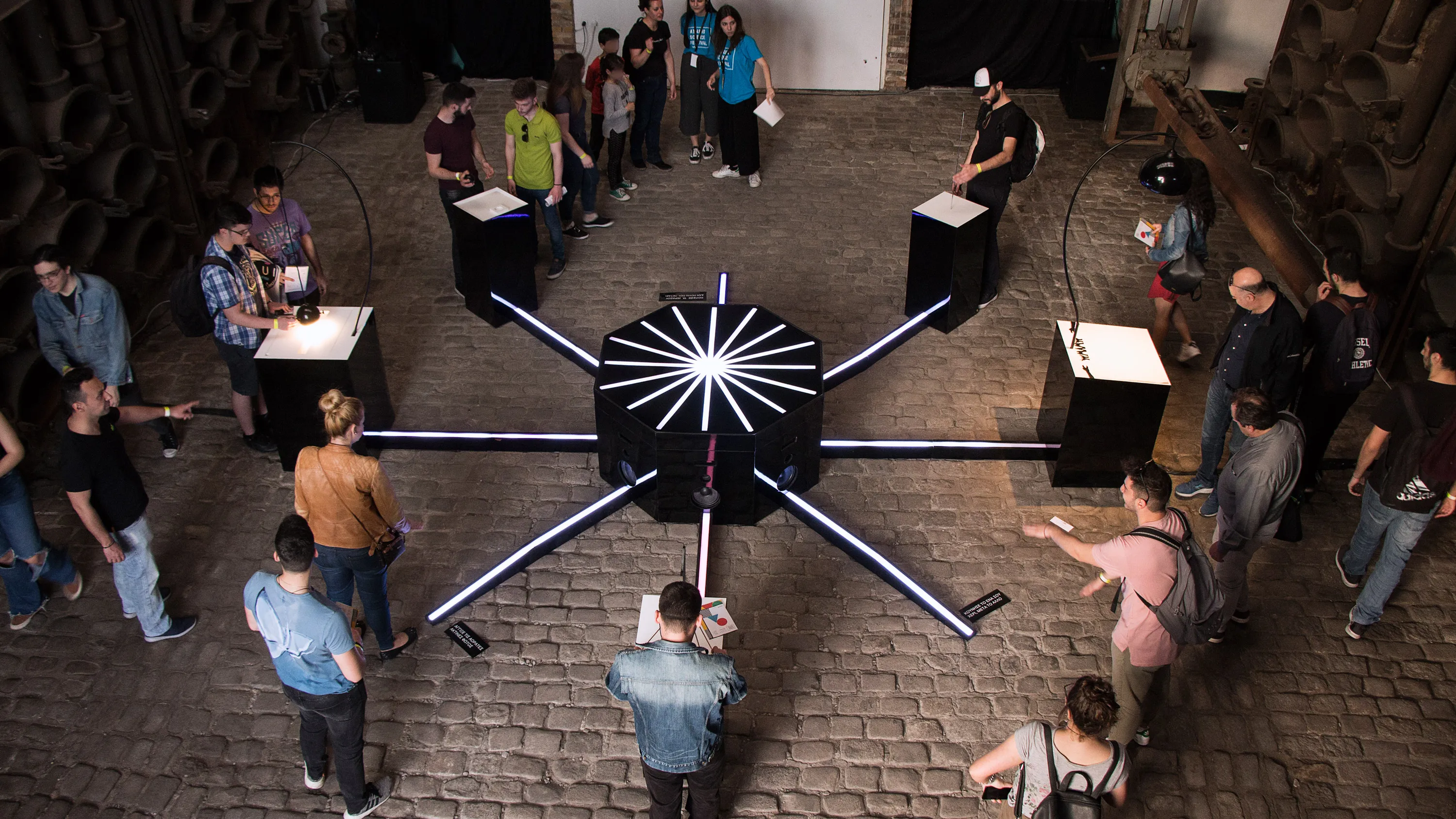 Overview photo showing participants playing with Cave of Sounds at Athens Science Festival. Photograph by Anastasia Alekseeva.
