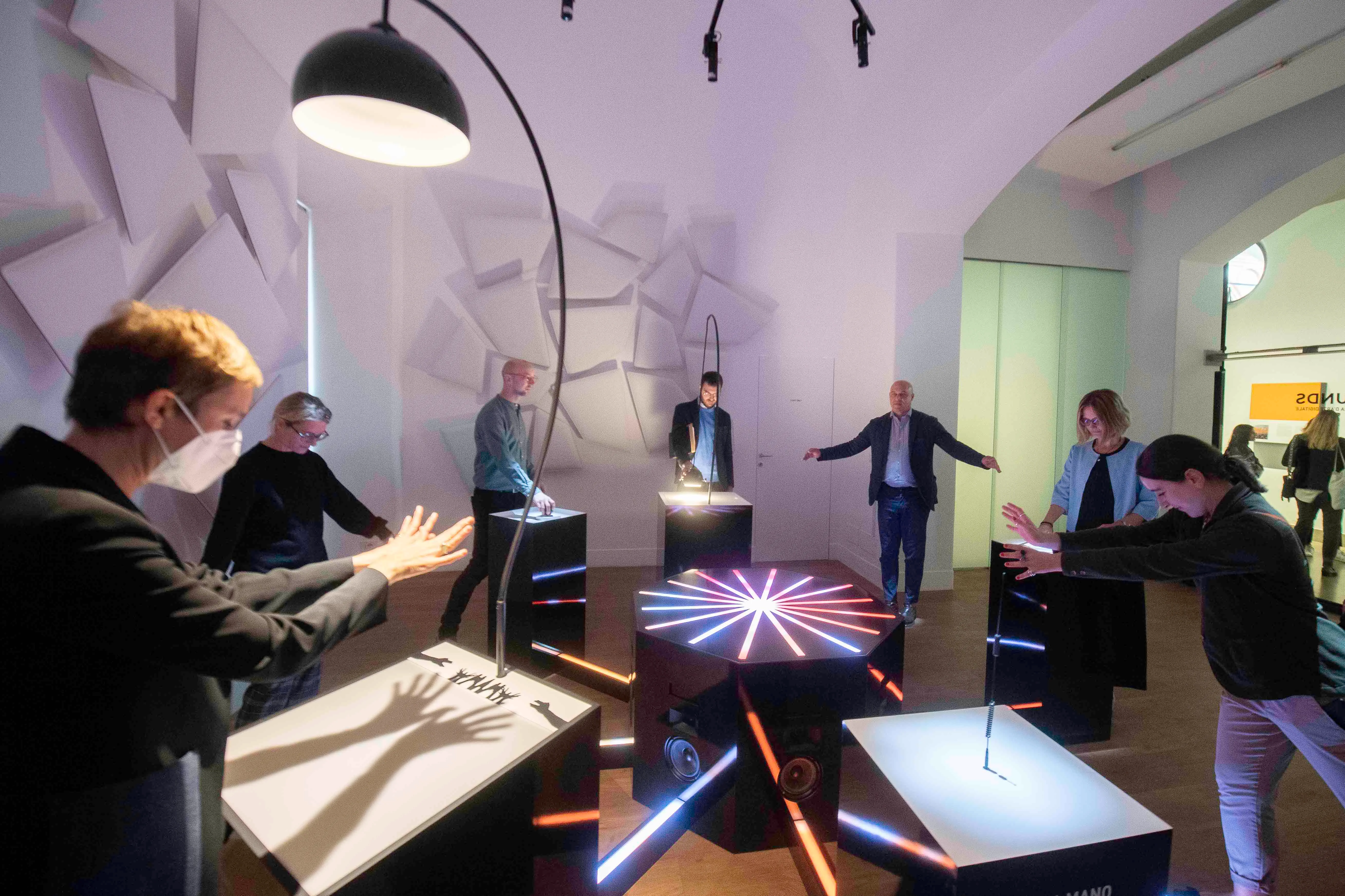Staff of the Milan Museum of Science and Technology play with Cave of Sounds, interactive sound installation by Tim Murray-Browne and the Music Hackspace Ensemble. Photographer: Andrea Fasani