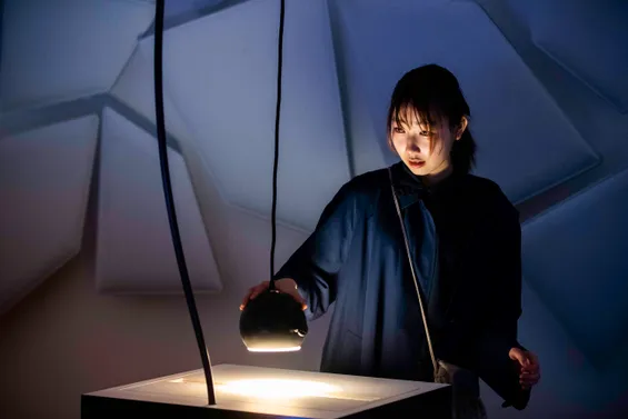 A participant plays with Cave of Sounds at the Milan Museum of Science and Technology. Photo: Andrea Fasani.
