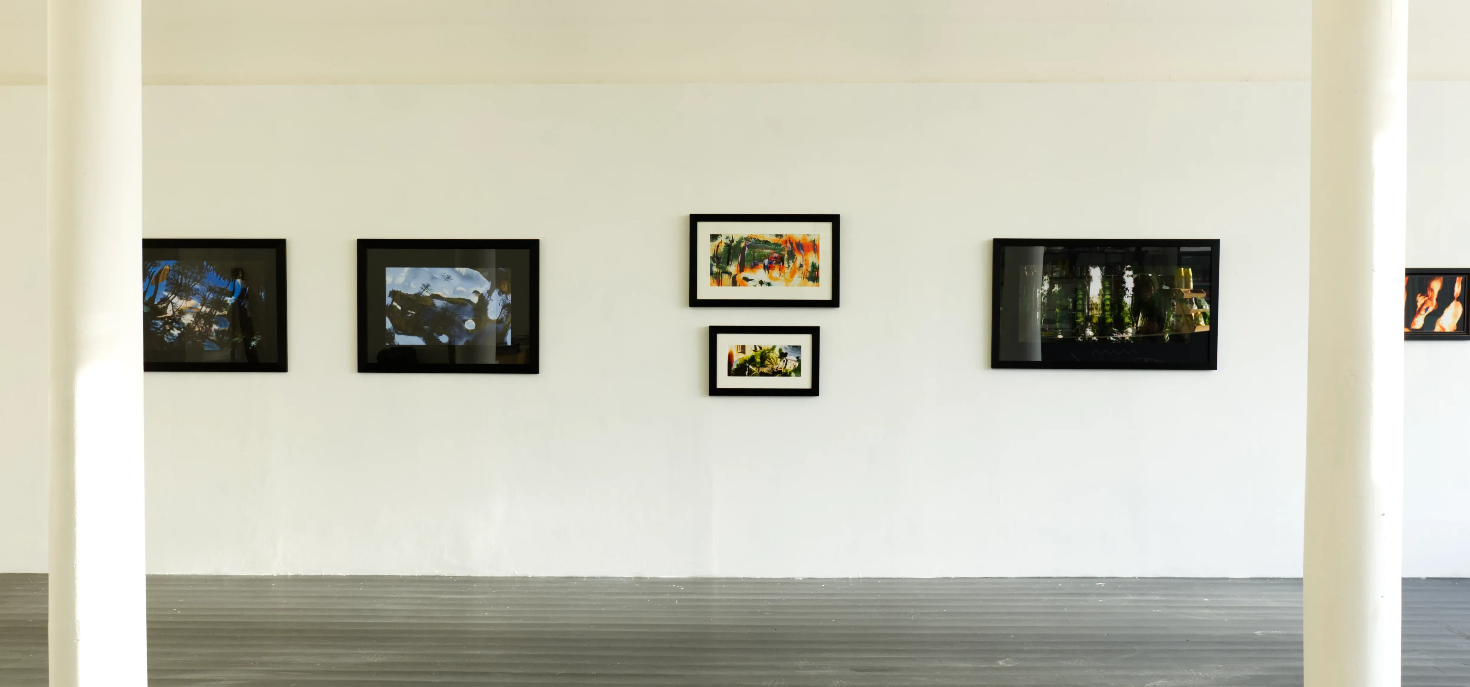 .wide A photo of framed prints on the wall. Taken at Tim Murray-Browne's exhibition “Small Frame Infinite Canvas” at South Block Project Space, Glasgow, Dec 2023. Photo: Tim Murray-Browne.