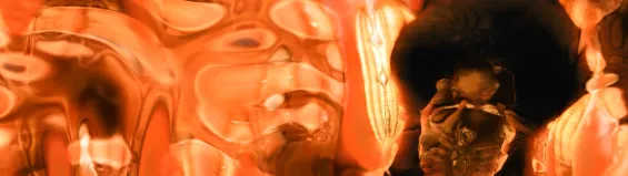 A still from ‘A short ride through hyperspace’ by Tim Murray-Browne. The AI-rendered image shows a dry plain seemingly suspended in a blue sky.