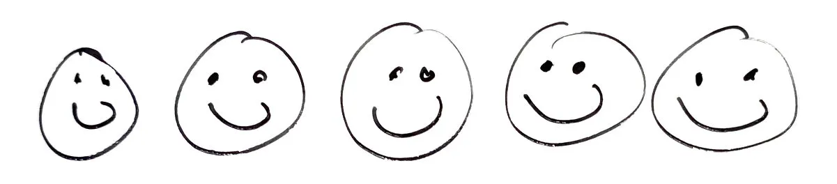 Five hand-drawn smiley faces